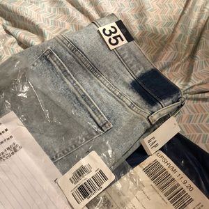 Gap Size:35 lighter wash jean. Some distressing.